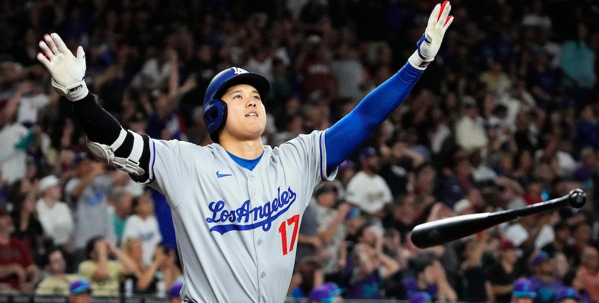 Los Angeles Dodgers Shohei Ohtani tosses his bat after hitting a three run home run against the Arizona Diamondbacks in the ninth inning at Chase Field in Phoenix on May 9, 2025.