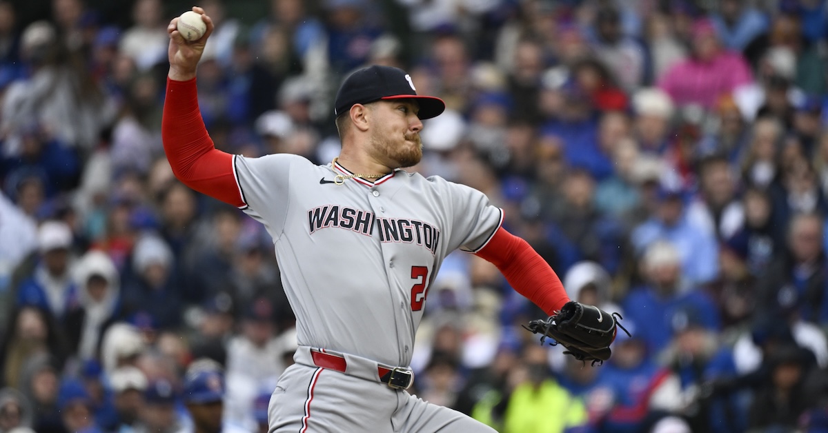 Washington Nationals pitcher Cade Cavalli (24) throws against the Chicago Cubs during the first inning at Wrigley Field.